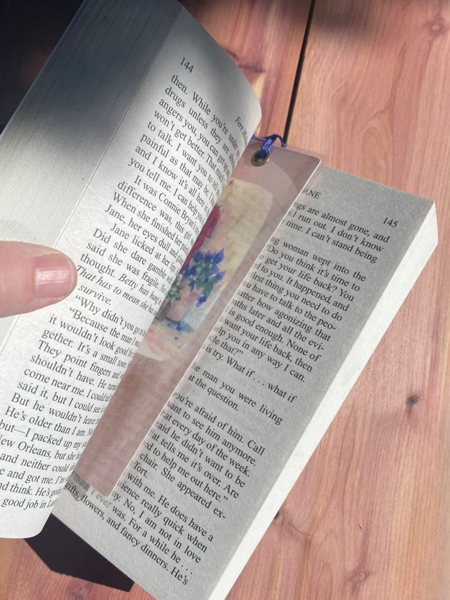 Bookmark shown in standard sized paperbook