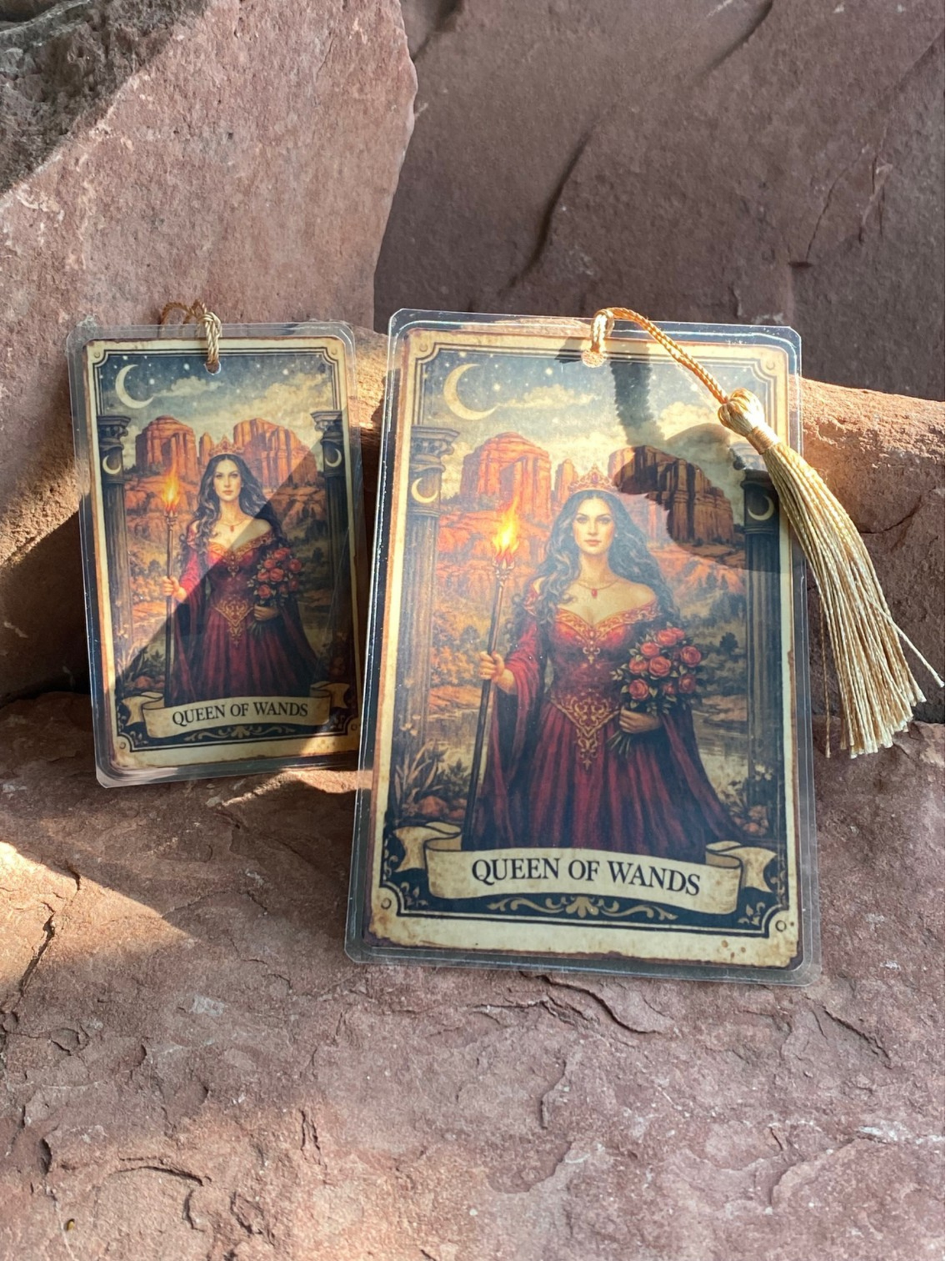 Scale reference photo of small bookmark next to extra large for scale reference only.
