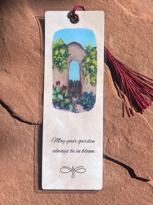 Bookmark with garden illustration and text on a textured surface
