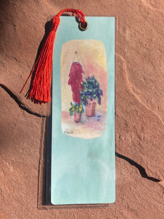 Bookmark with a painting of plants on a textured surface