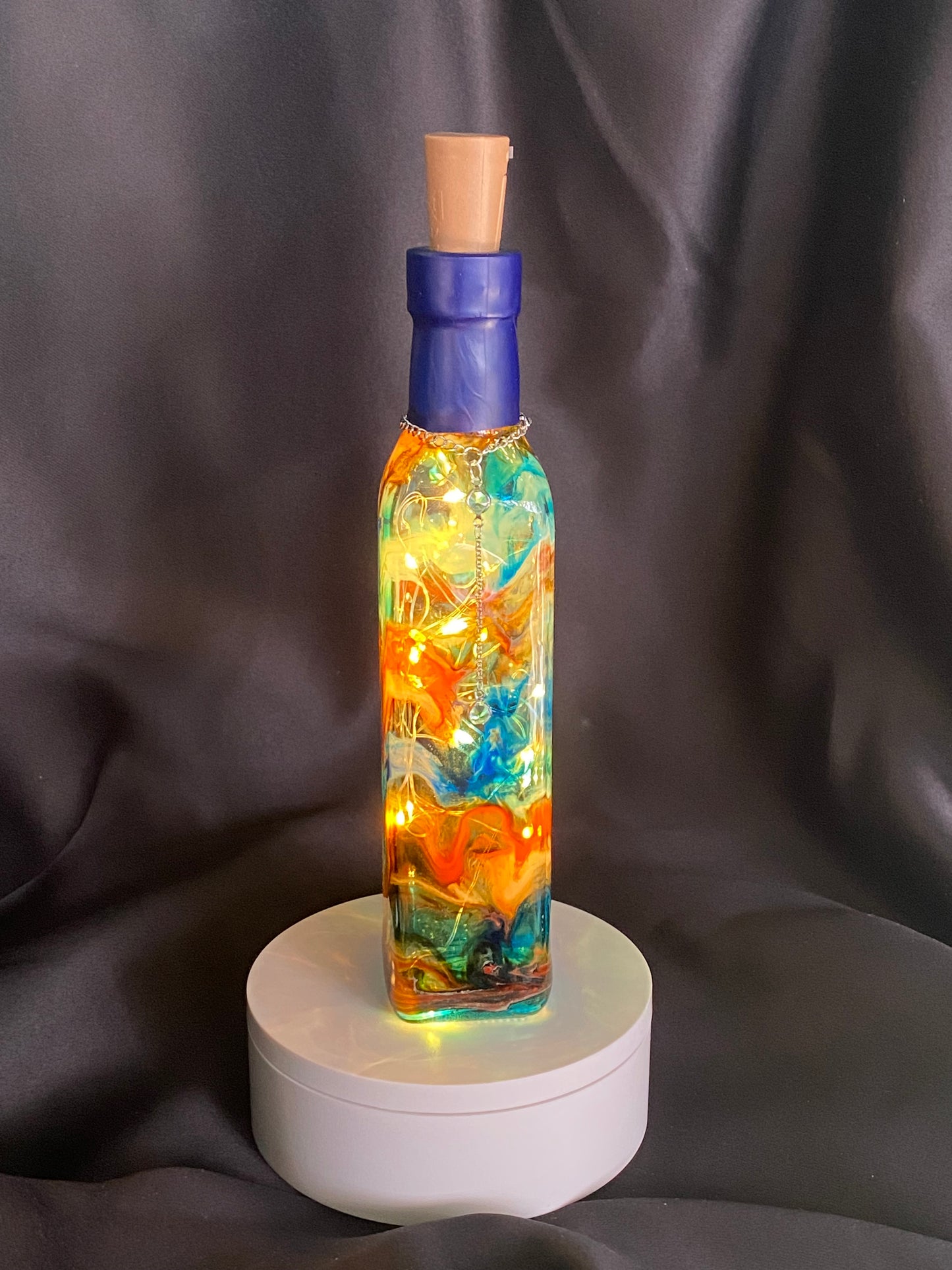 The Light From Within: Orange and Blue Lighted Bottle